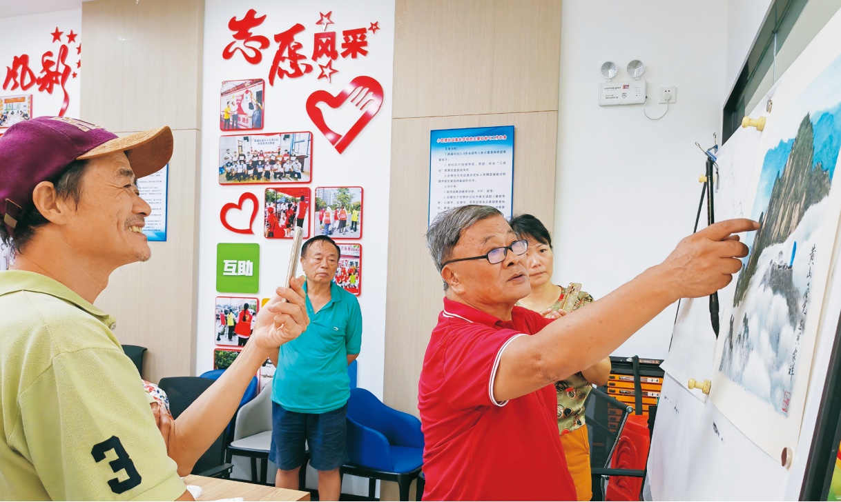 流动党员担任社区书画班公益讲师。